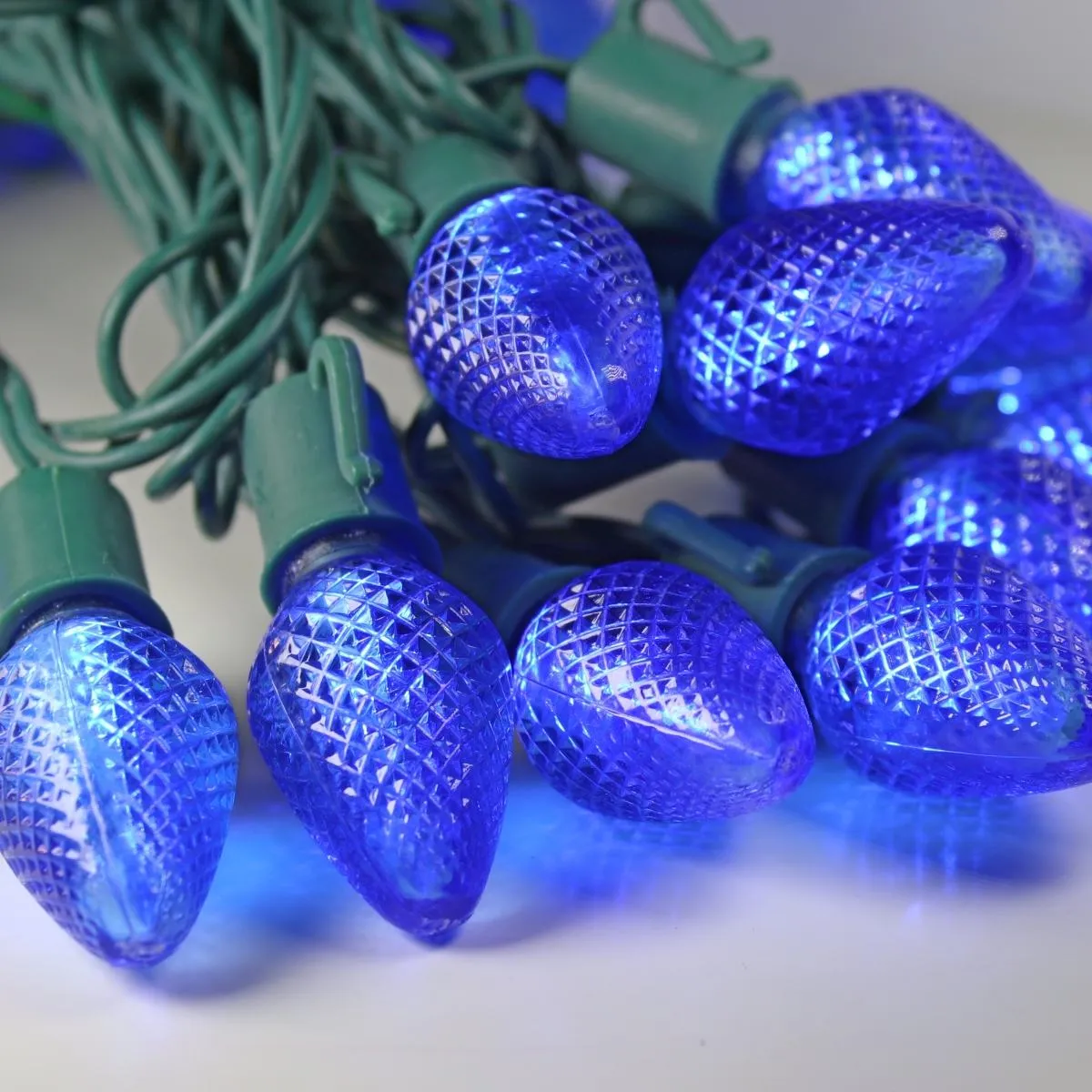 25-light C7 Blue LED Christmas Lights, 8" Spacing Green Wire